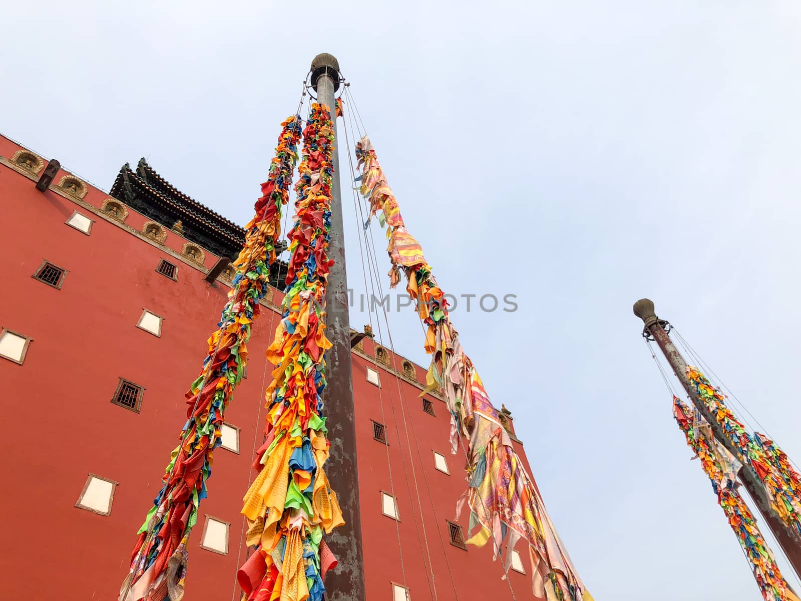 Buddhist color prayer flags at The Putuo Zongcheng Buddhist Temple, one of the Eight Outer Temples of Chengde, built in 1767 and modeled after the Potala Palace of Tibet. Chengde, China