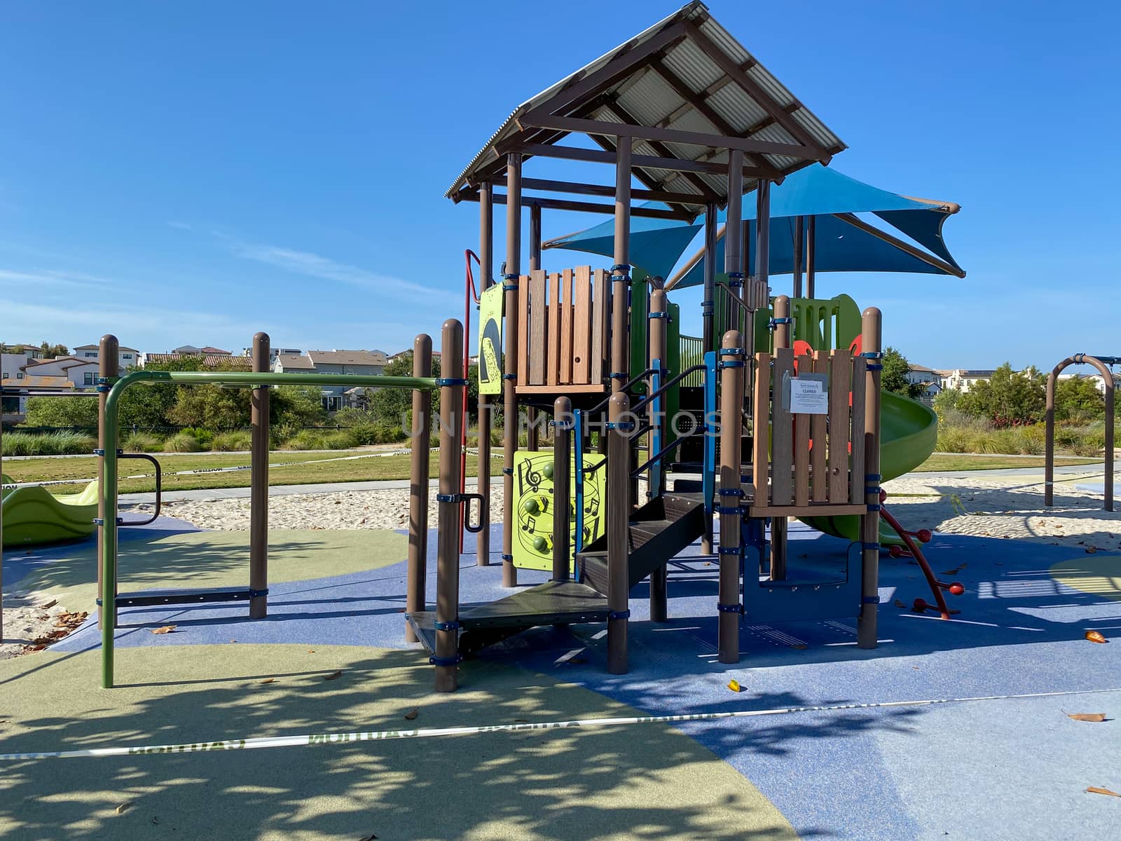 Closed community park with playground for kids due to Covid 19. Coronavirus virus panic and quarantine in San Diego, California, USA.