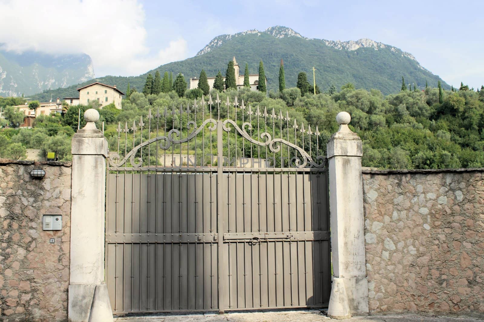 ancient stone gate on the lake in Italy