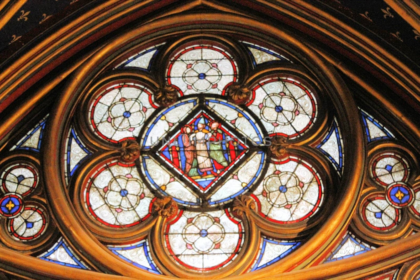 The Sainte Chapelle (Holy Chapel) in Paris, France. The Sainte Chapelle is a royal medieval Gothic chapel in Paris and one of the most famous monuments of the city