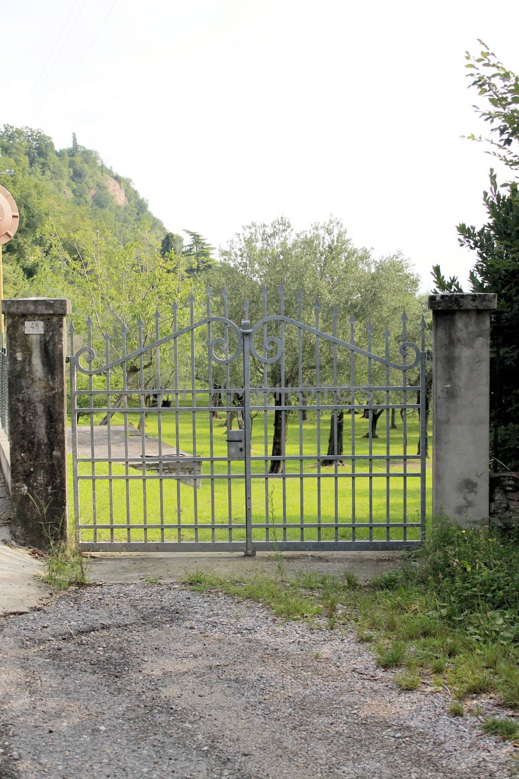 ancient stone gate on the lake in Italy