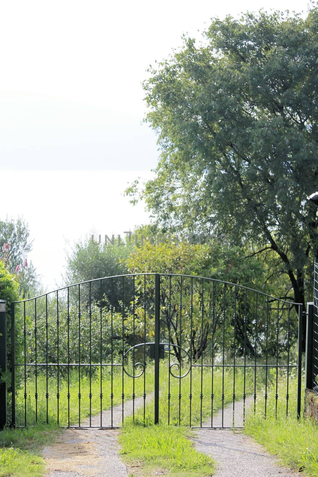 ancient stone gate on the lake in Italy