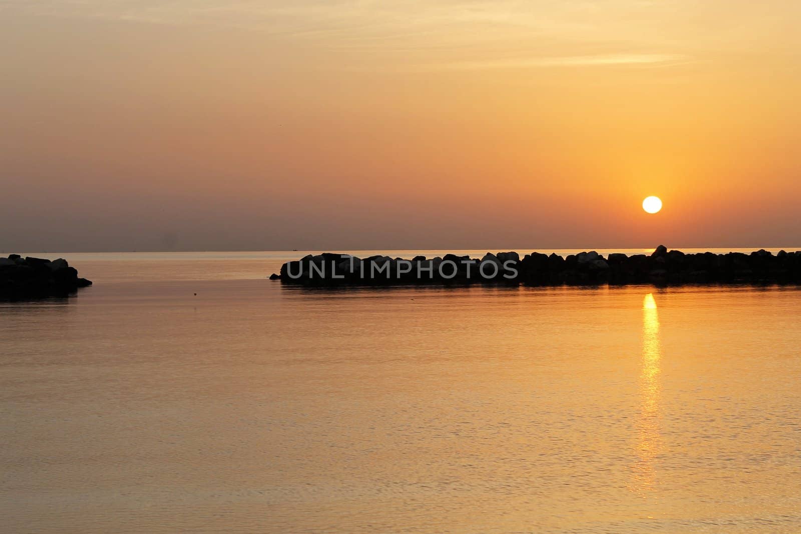 sunrise on the beach of the Adriatic sea in Italy