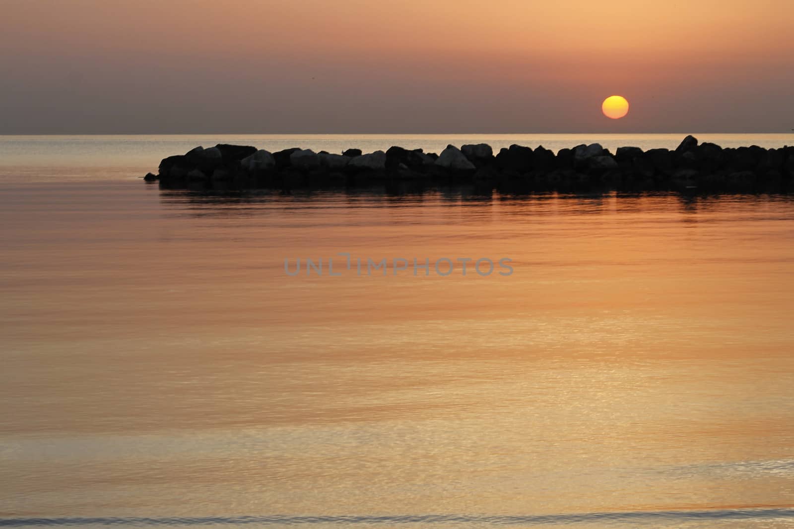 sunrise on the beach of the Adriatic sea in Italy