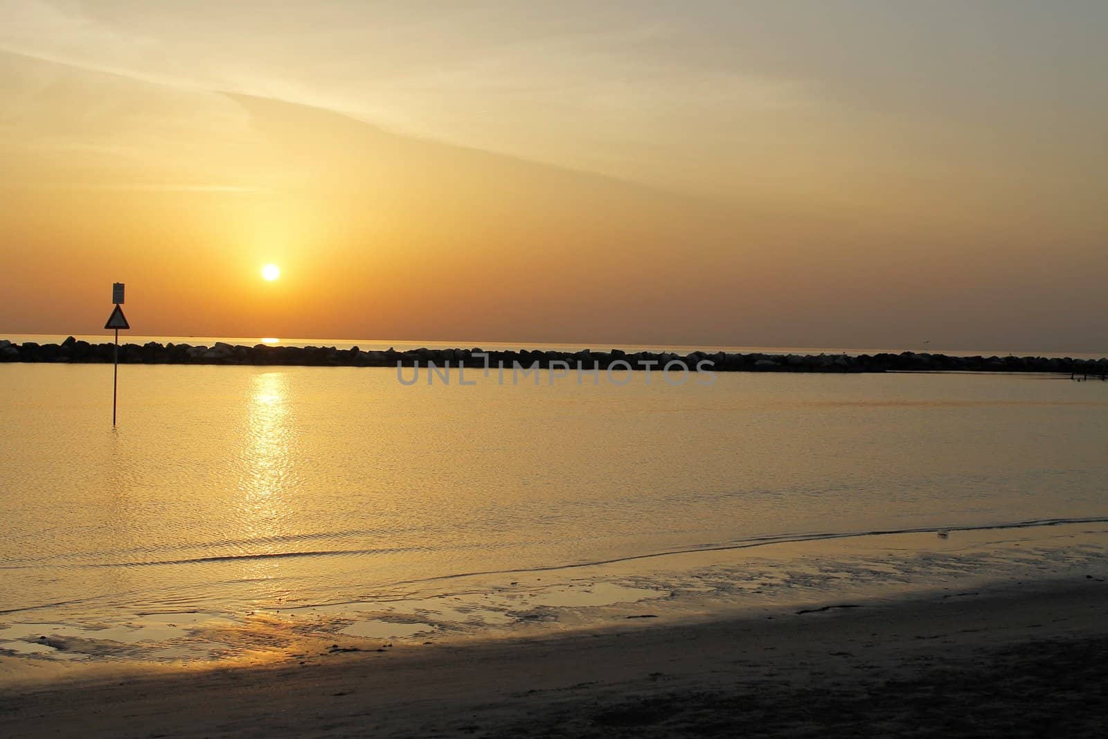 sunrise on the beach of the Adriatic sea in Italy