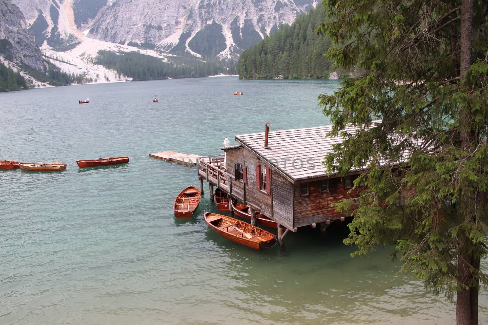 Wooden hut on lake Braies, Dolomites, Italy