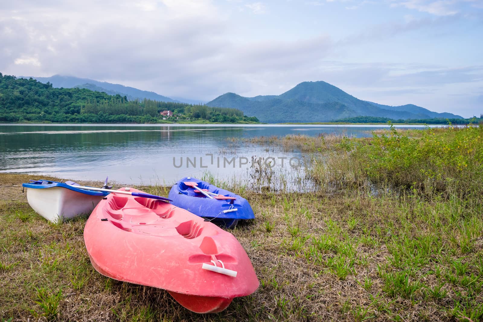 kayak near the lake with mountain background