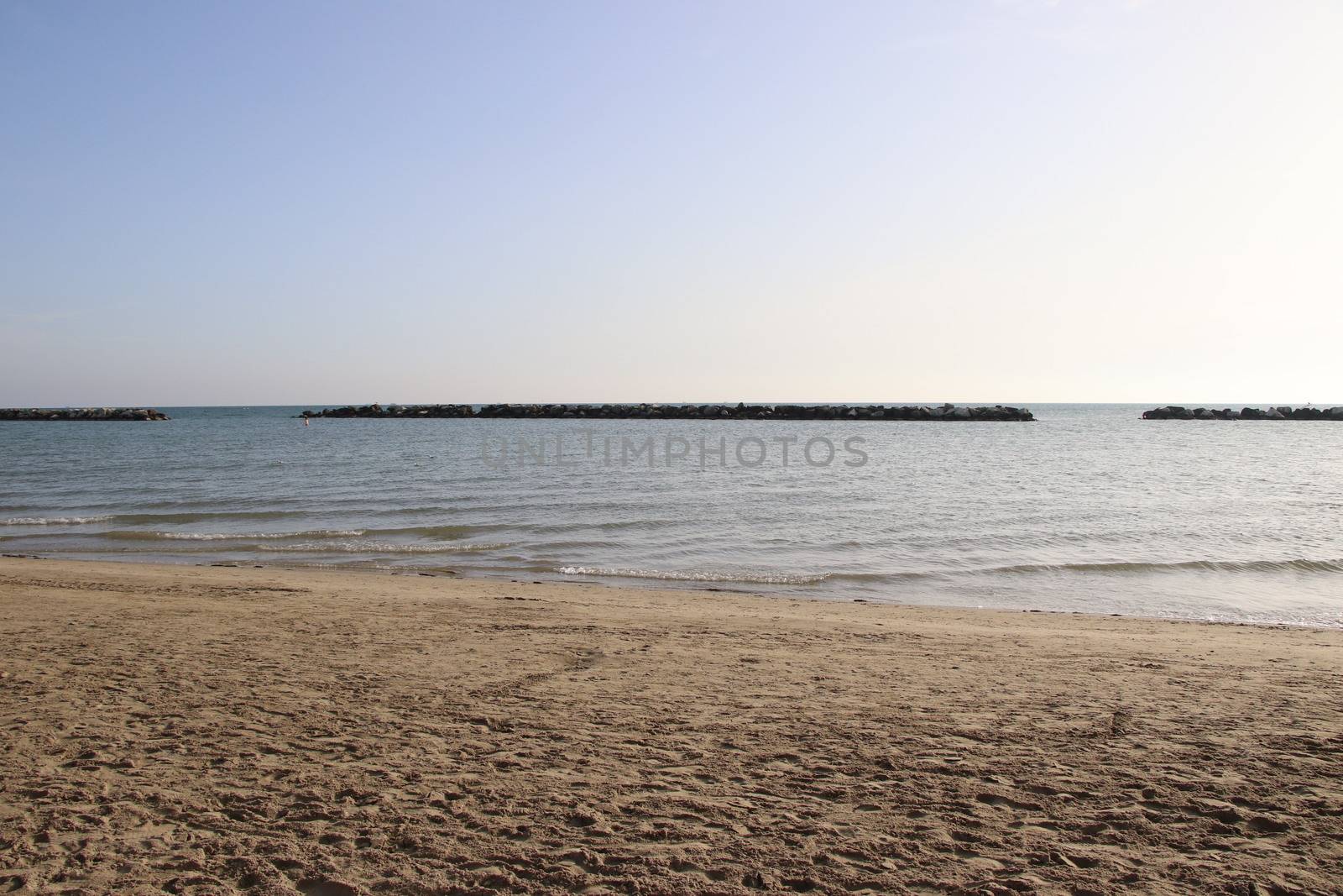 view of the blue ocean waves on the beach.