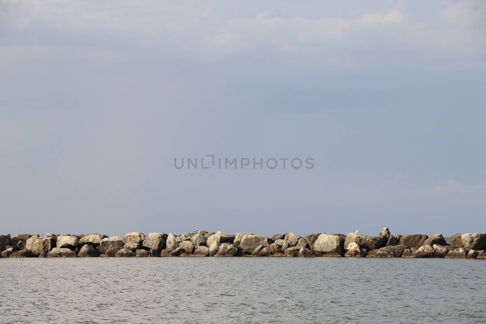 Rocks to protect the coast in the Adriatic sea in Italy