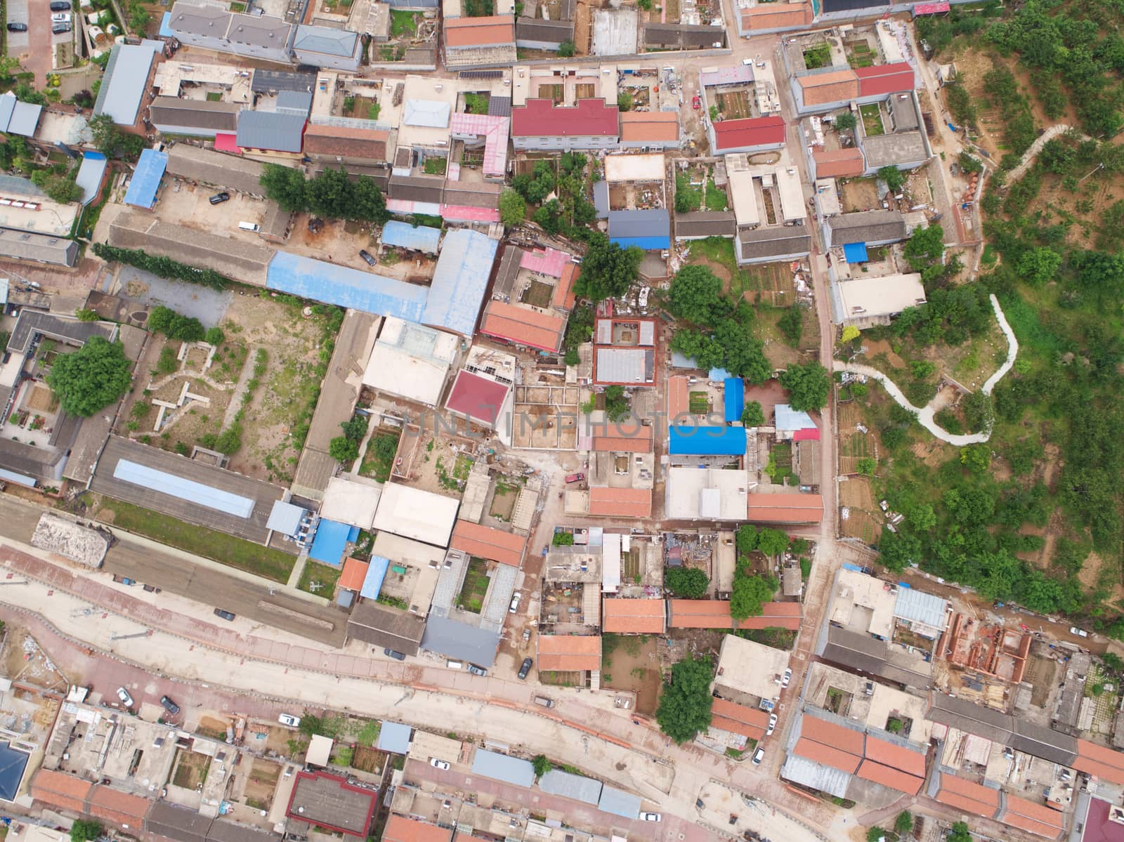 Aerial view top view of small village with little courtyard and farm style house, Huaibei, China by Bonandbon