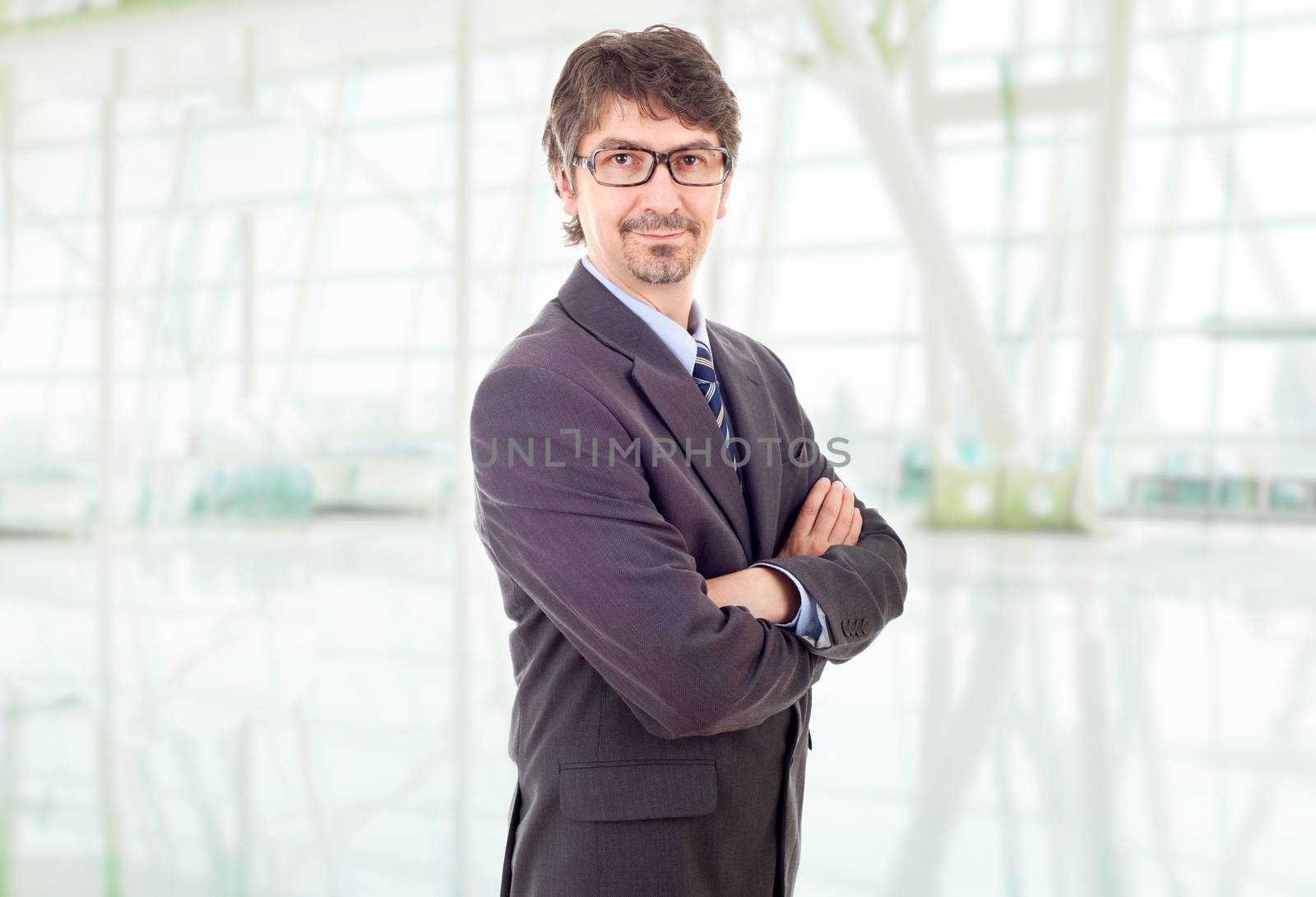 happy business man portrait at the office