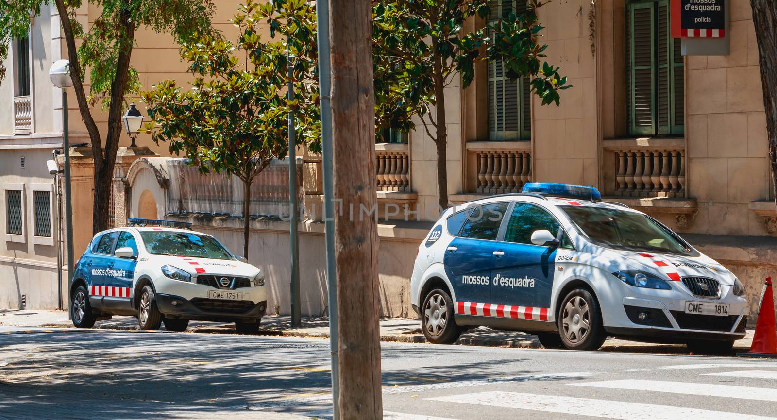 Police car parked in front of a small police station by AtlanticEUROSTOXX