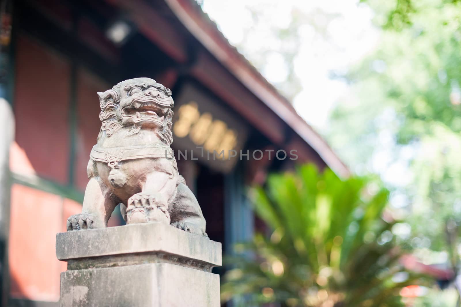 Lion stone statue in a buddhist temple, Chengdu, China