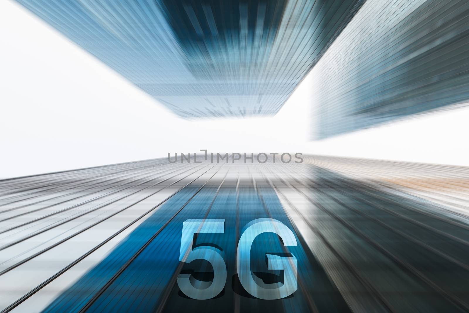 5G on motion blurred skyscrapers low angle view against white sky
