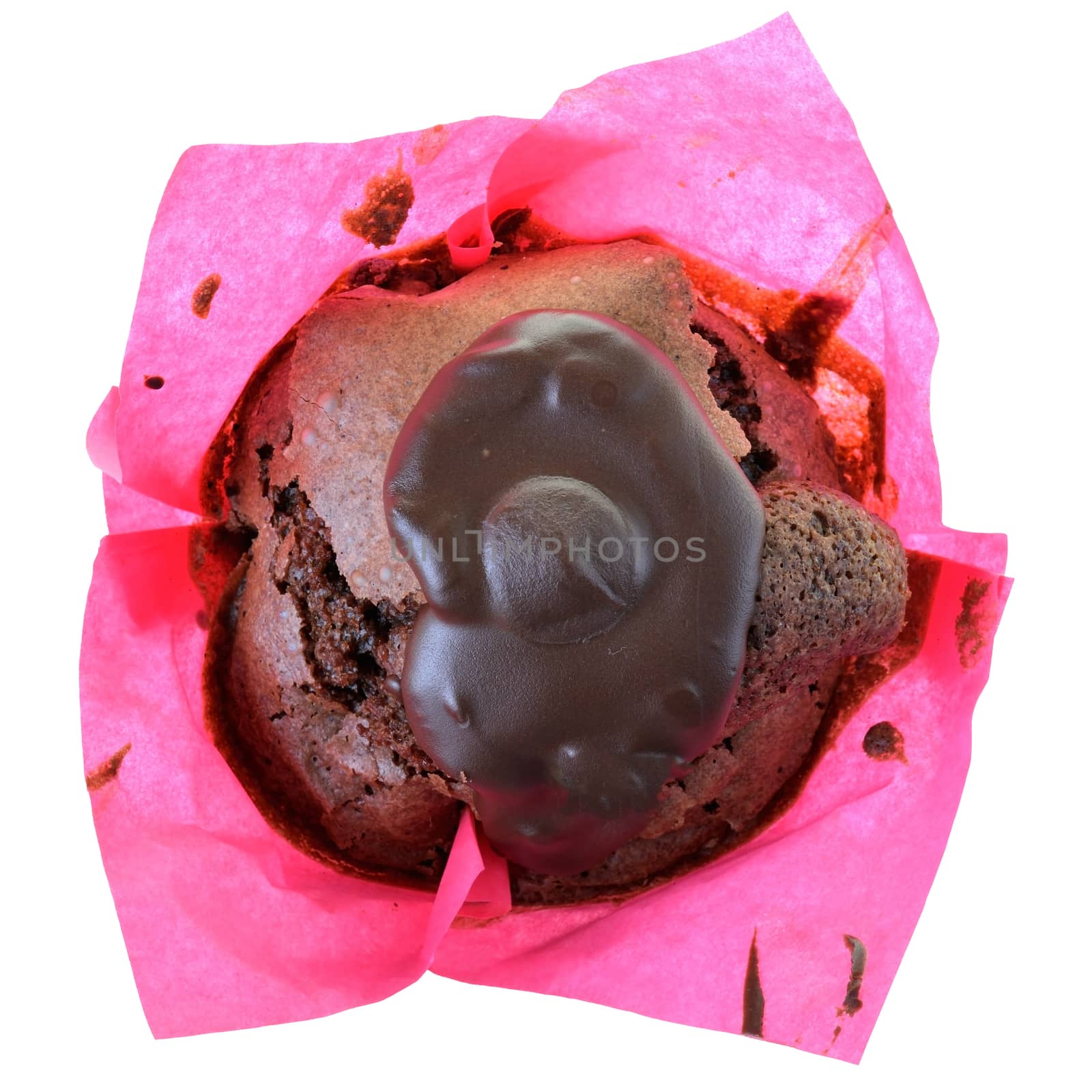 Dark muffin with chocolate glaze Isolated on a white background.