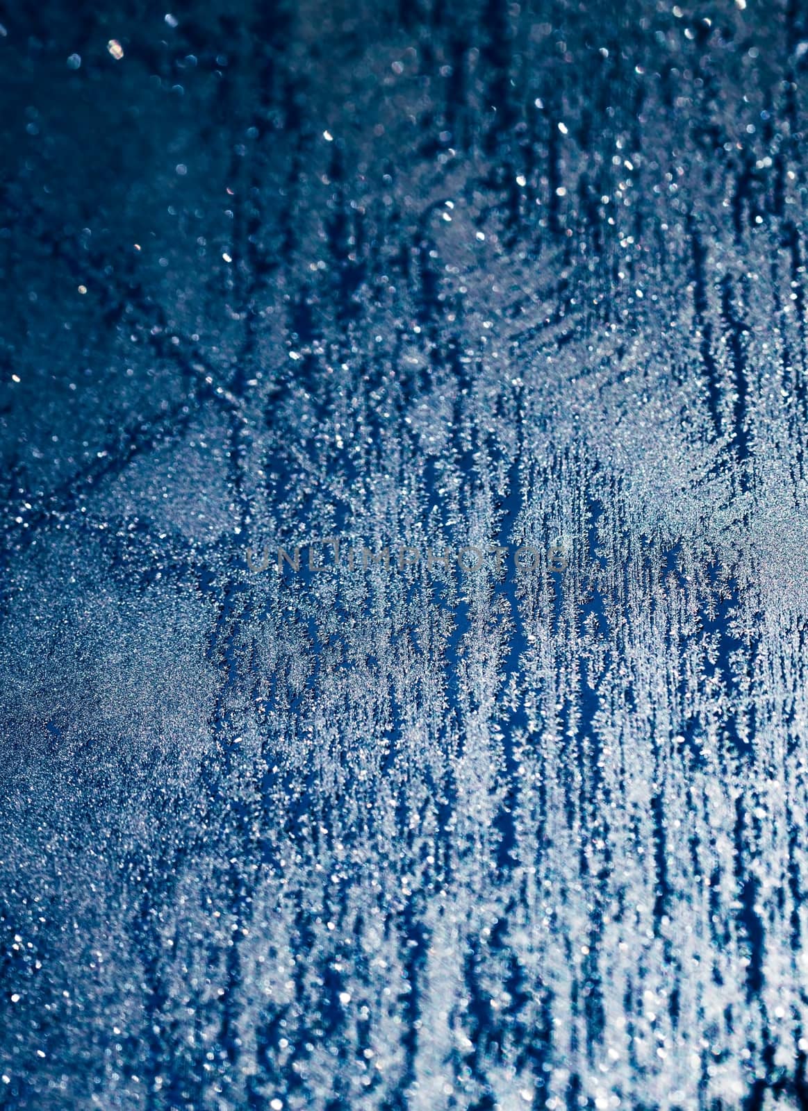 Frosty natural pattern on winter window night