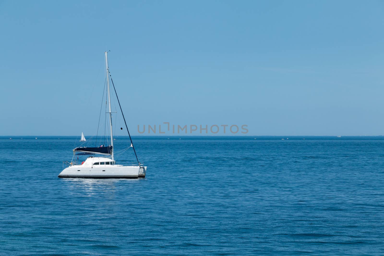 Luxury boat anchored in the middle of a turquoise sea by AtlanticEUROSTOXX