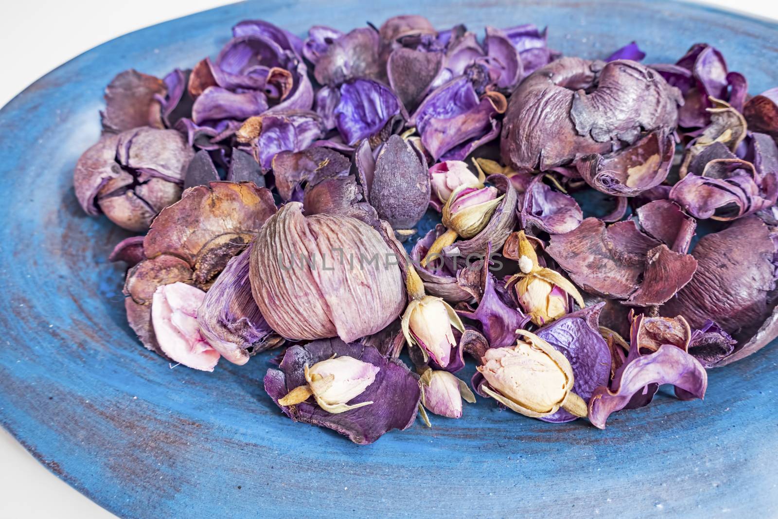 dried rose petals in a bowl