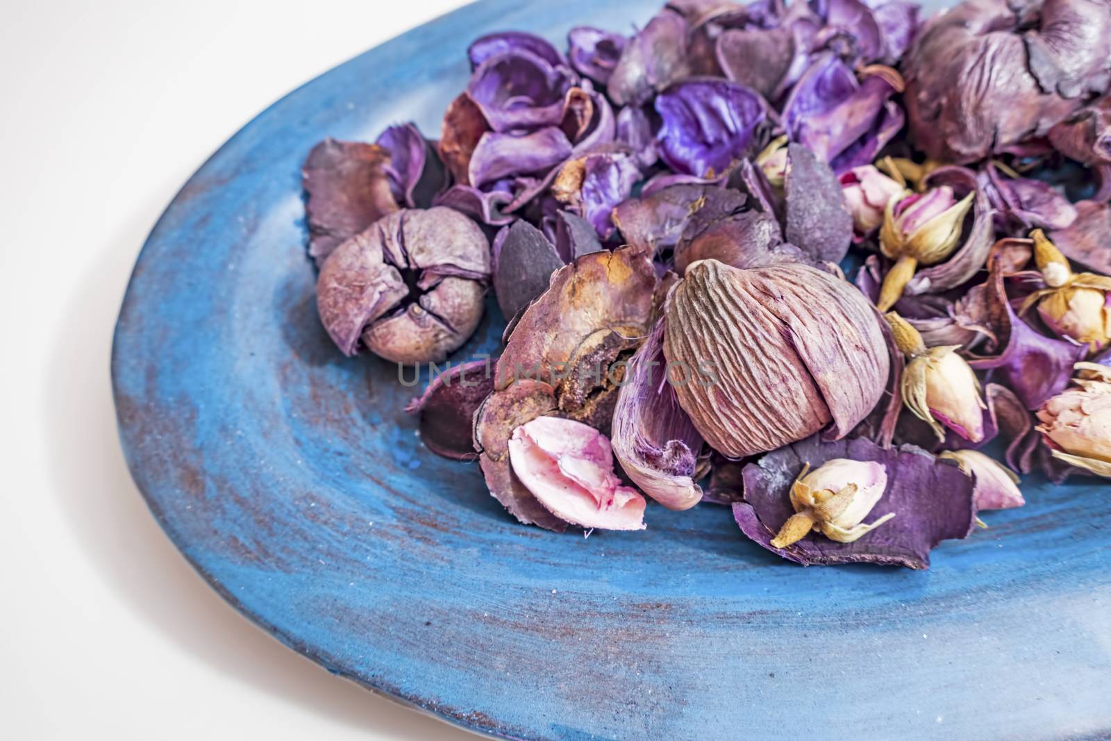 dried rose petals in a bowl