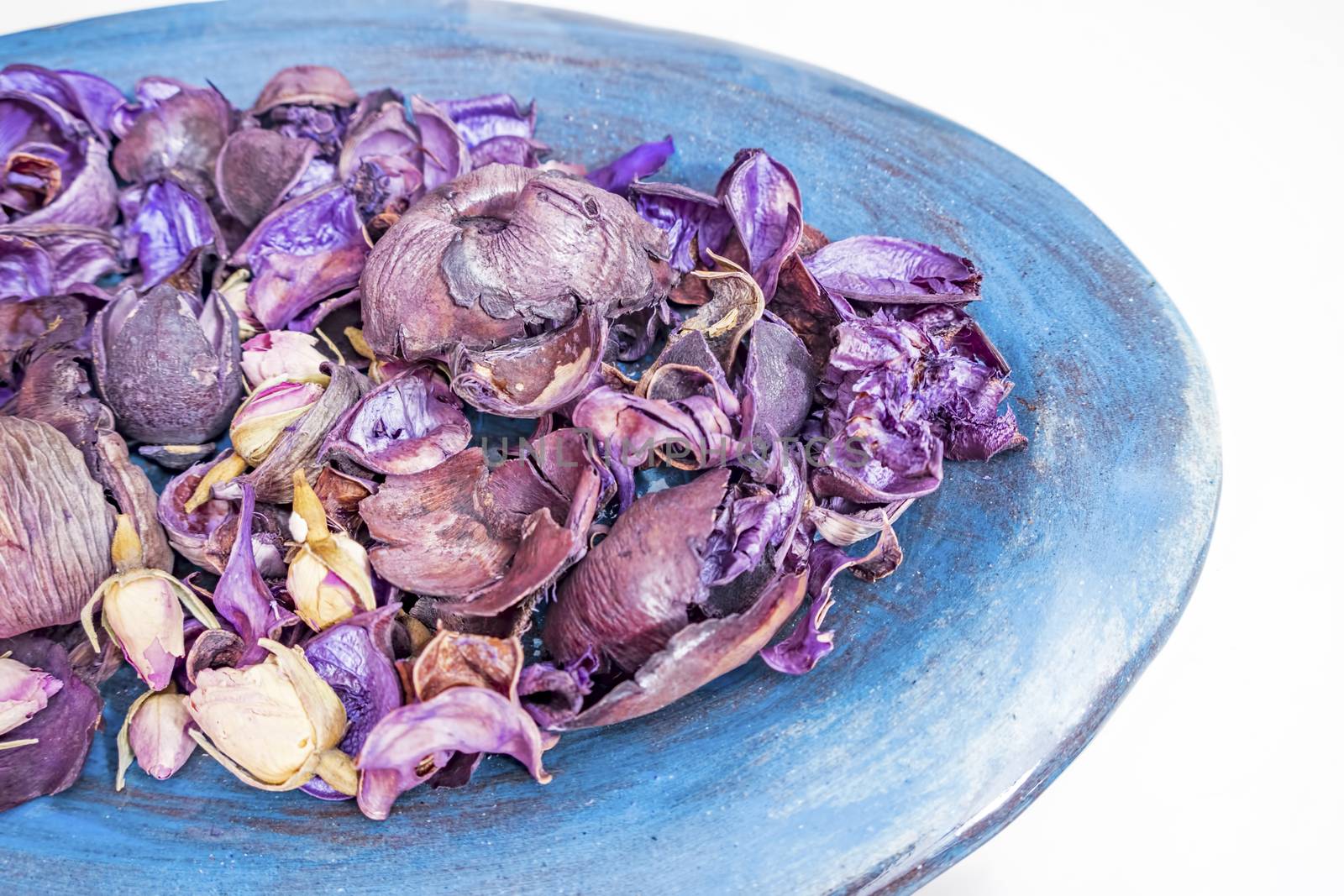 dried rose petals in a bowl