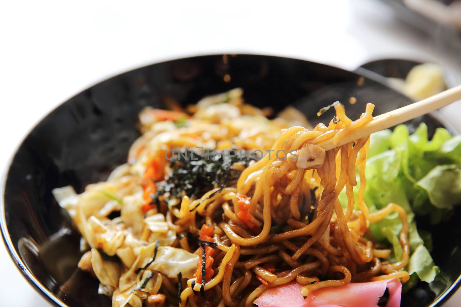 Japanese cuisine, fried noodles Yakisoba  by piyato