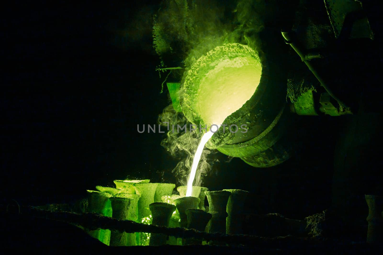 steel casting process toned green for magic potion or chemical or biohazard or radioactive waste illustration.