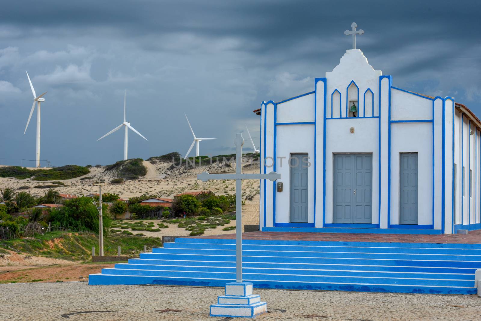 Church in front of Wind farm at Canoa Quebrada on Brazil