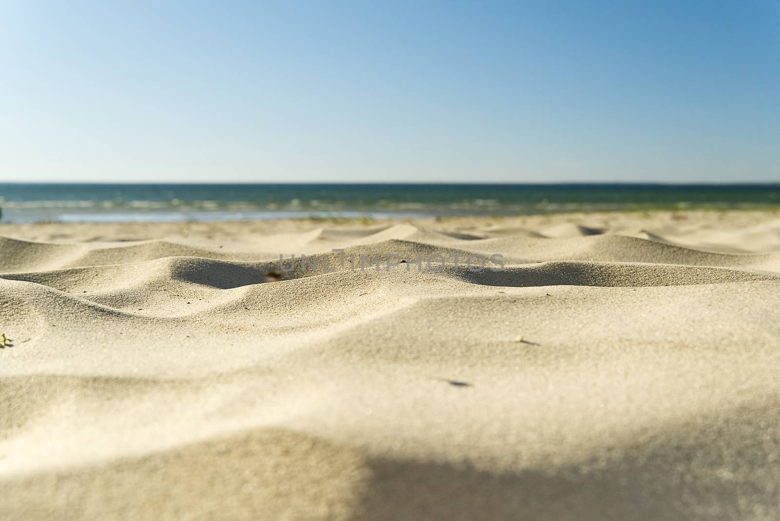 Baltic sea beach. Sea on the sandy beach. Sandy beach in Estonia