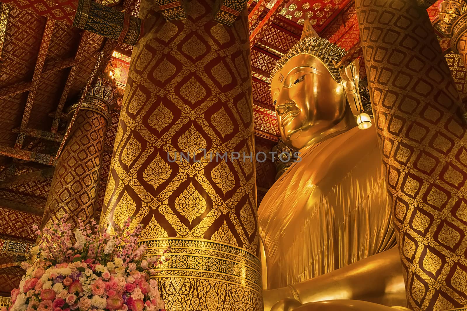Ayutthaya, Thailand -July, 31, 2018 : Giant golden Buddha in Wat by Bubbers
