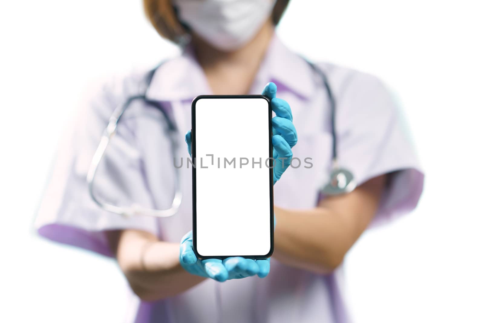 Doctor in uniform holding smart phone with blank white screen for text. Coronavirus, covid-19 outbreak concept. isolated on white background.