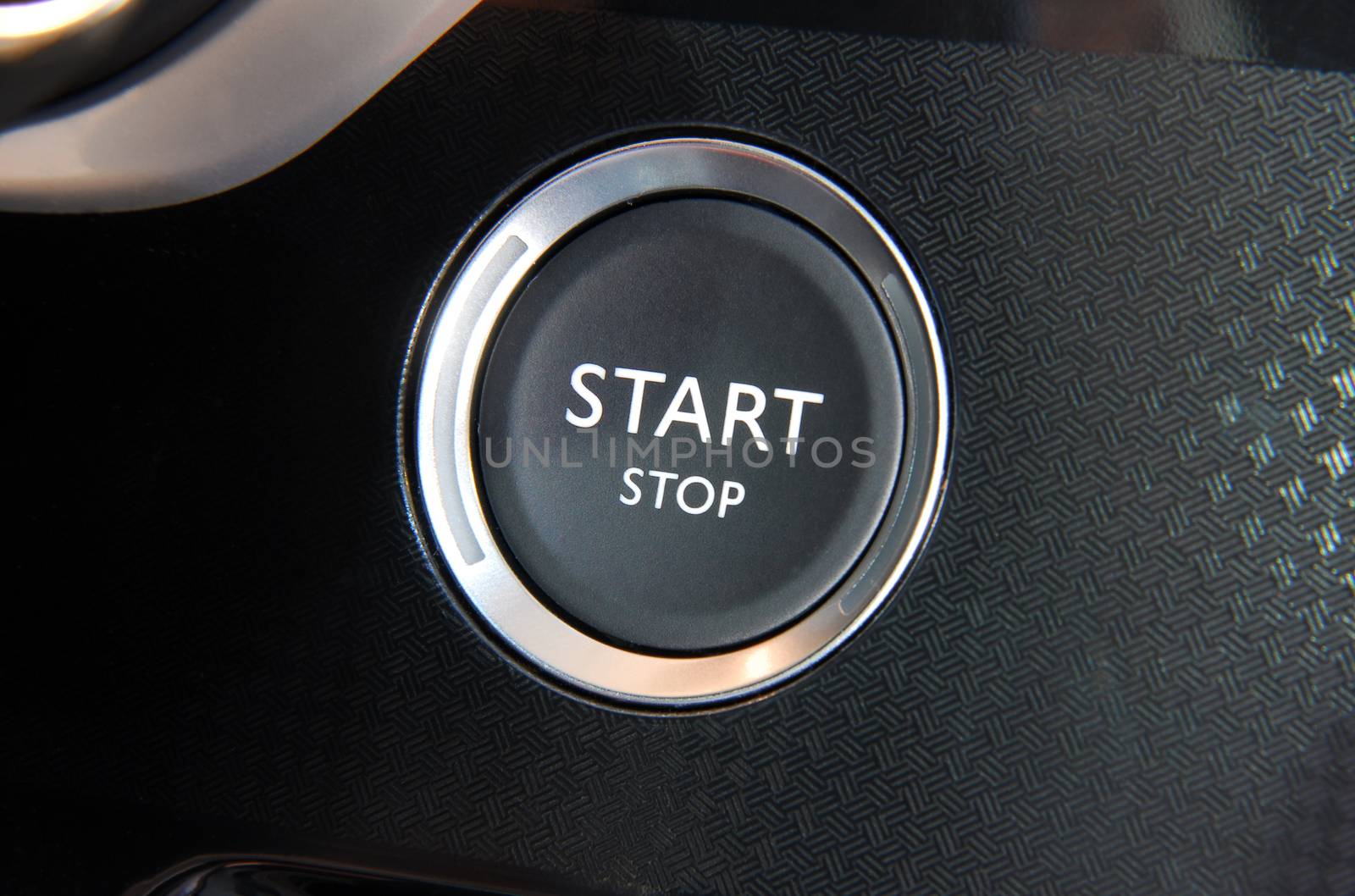 Start stop engine button on a modern car dashboard