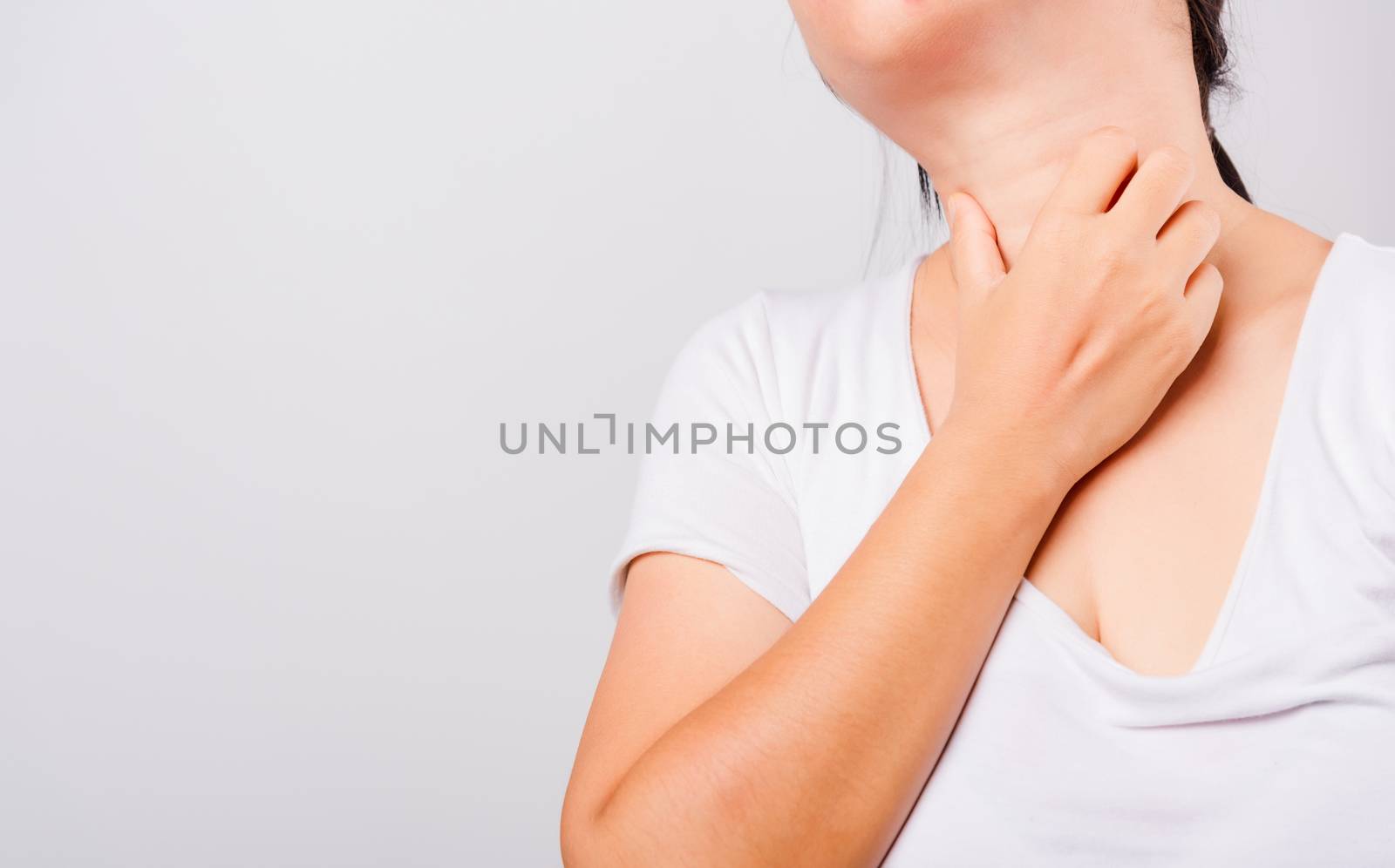 Asian beautiful woman itching her useing hand scratch itch neck on white background with copy space, Medical and Healthcare concept