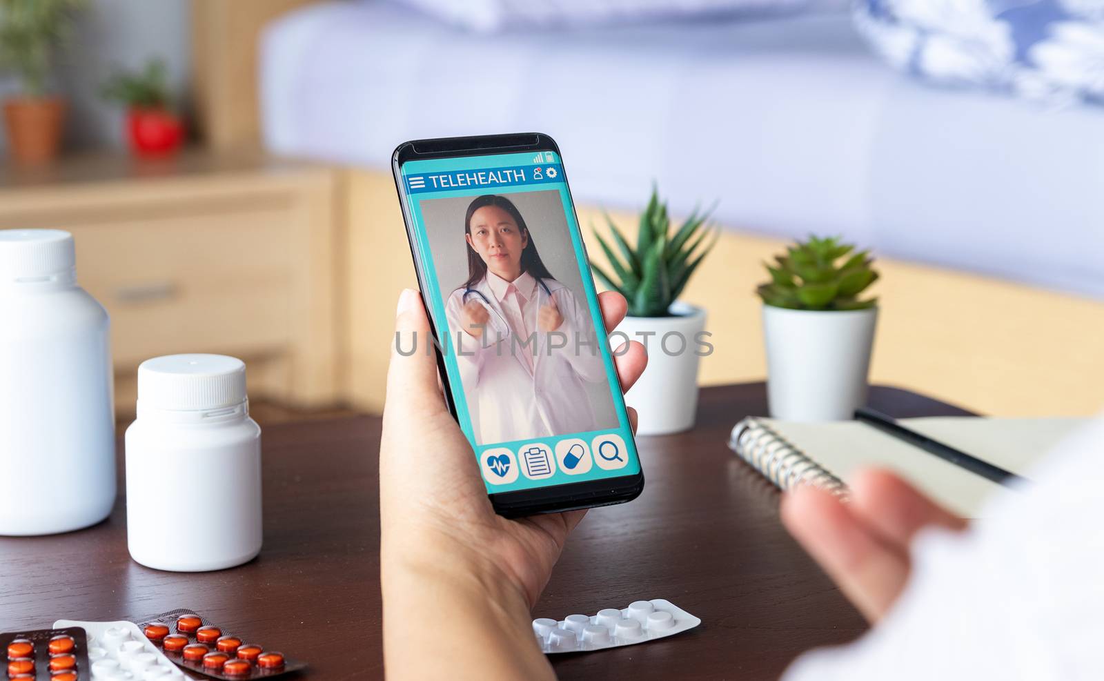 deaf mute patient use video conference, make online consultation by sign language with doctor on mobile phone application about illness, medicine via vdo call. Telehealth,Telemedicine, online hospital by asiandelight
