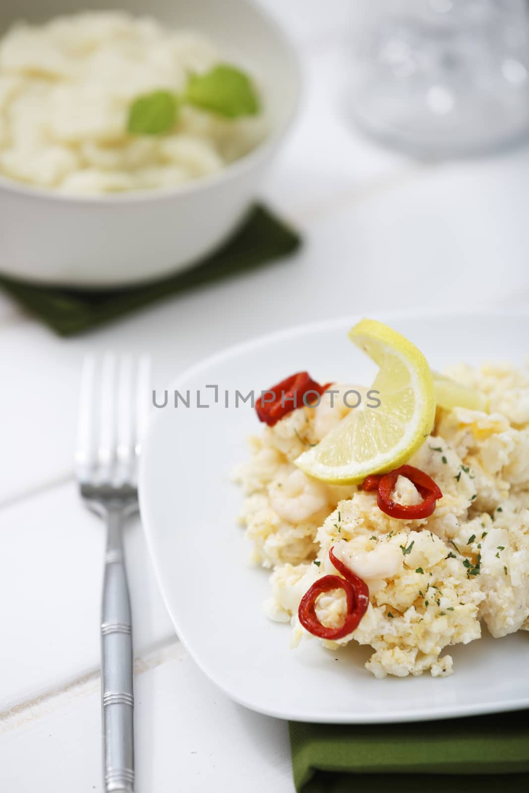 Scrambled eggs with prawns and hake and cauliflower mashed with leek.