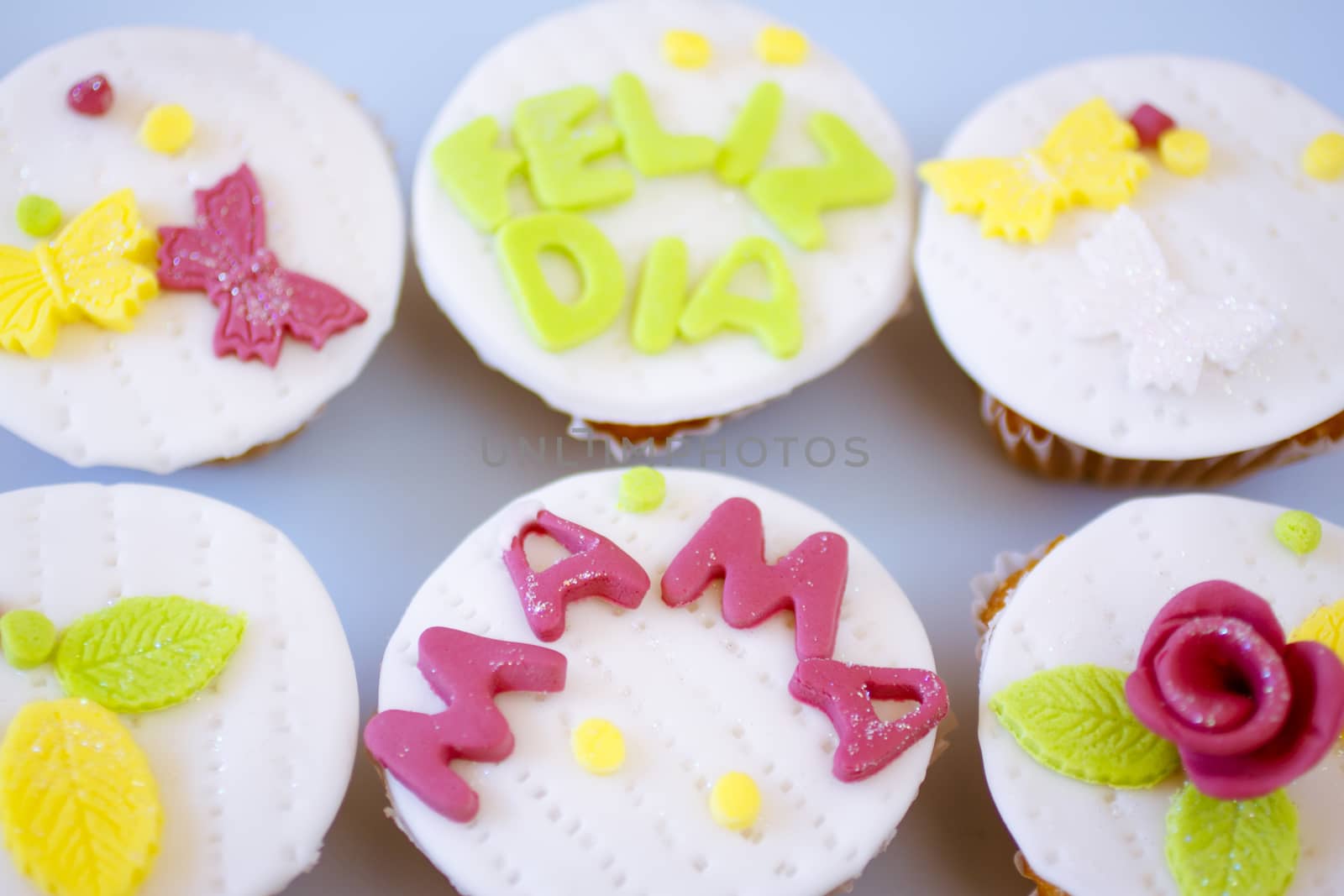 Fancy muffins decorated with fondant