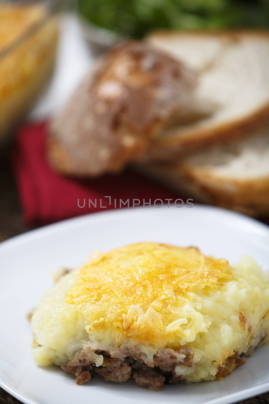 Ration of meat pie with bread.