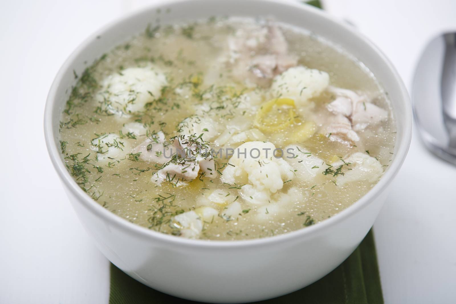 Soup with leek, cauliflower and chicken.