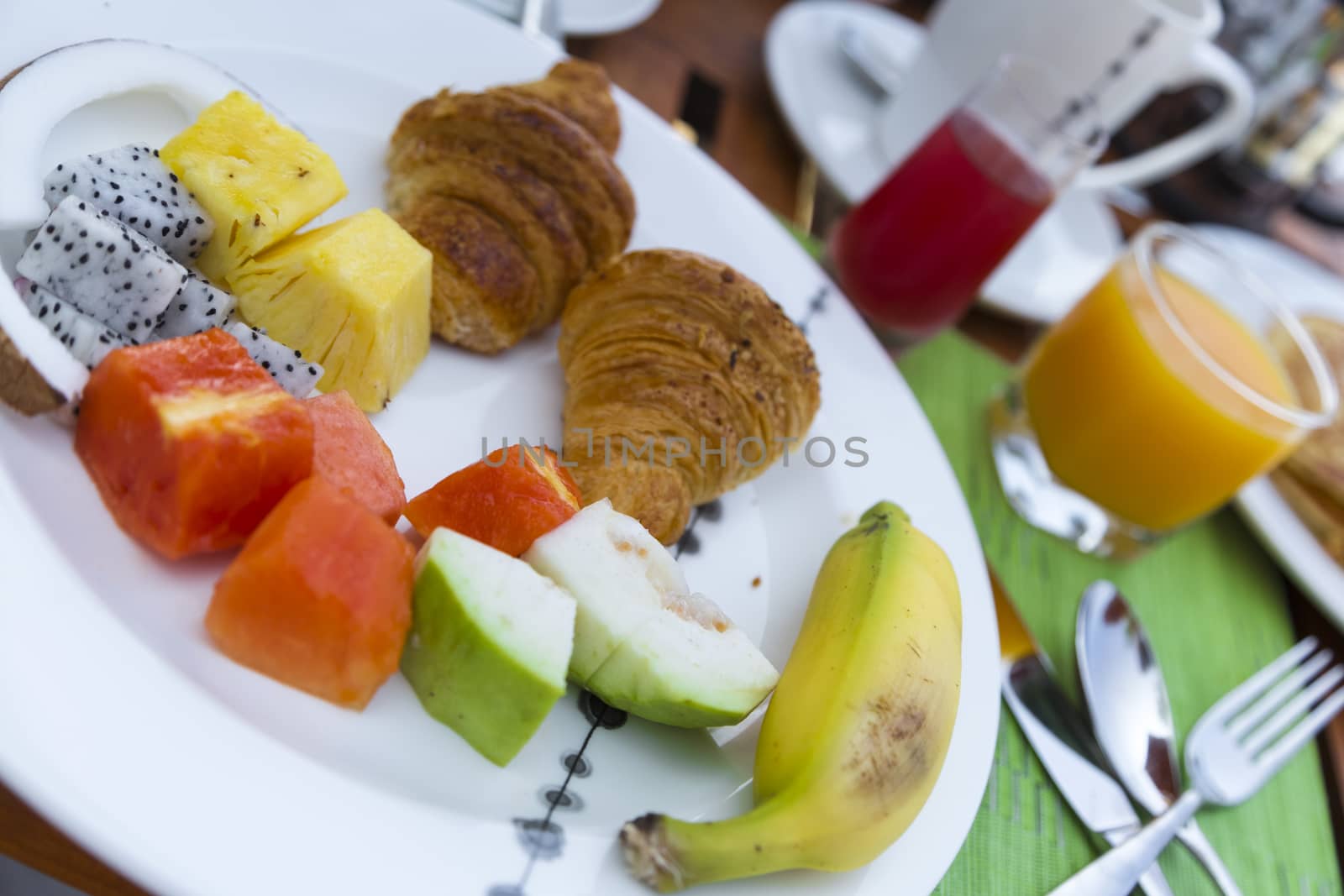 Breakfast with Tropical Fresh Fruit and Pancakes by Nemida