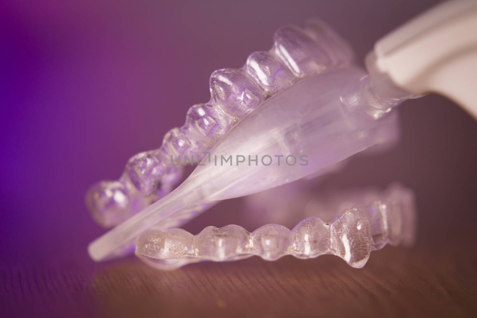 Vibrating dental device with invisible orthodontics by GemaIbarra