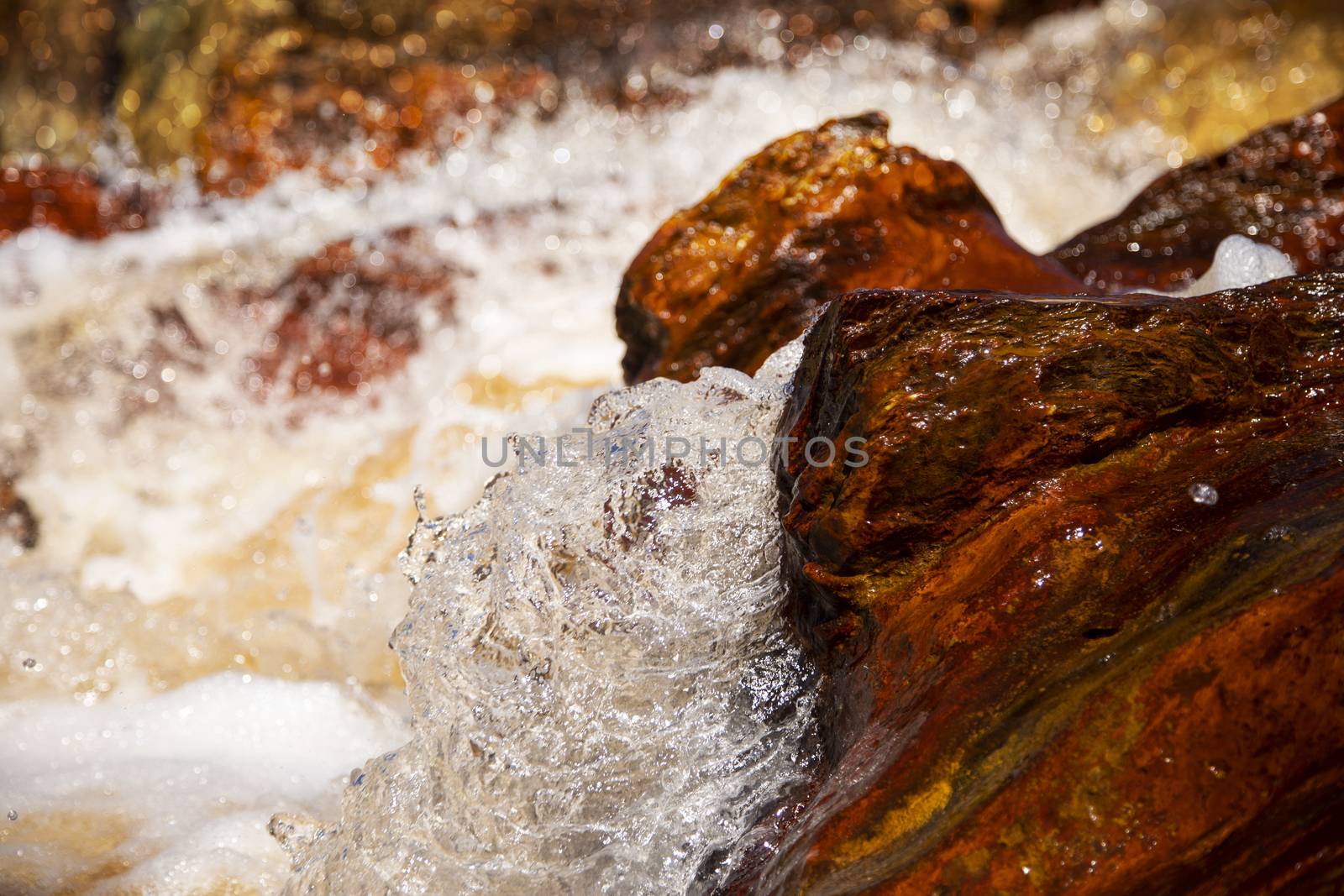 Beautiful landscape in Huelva, Rio Tinto, small cascade with water flowing