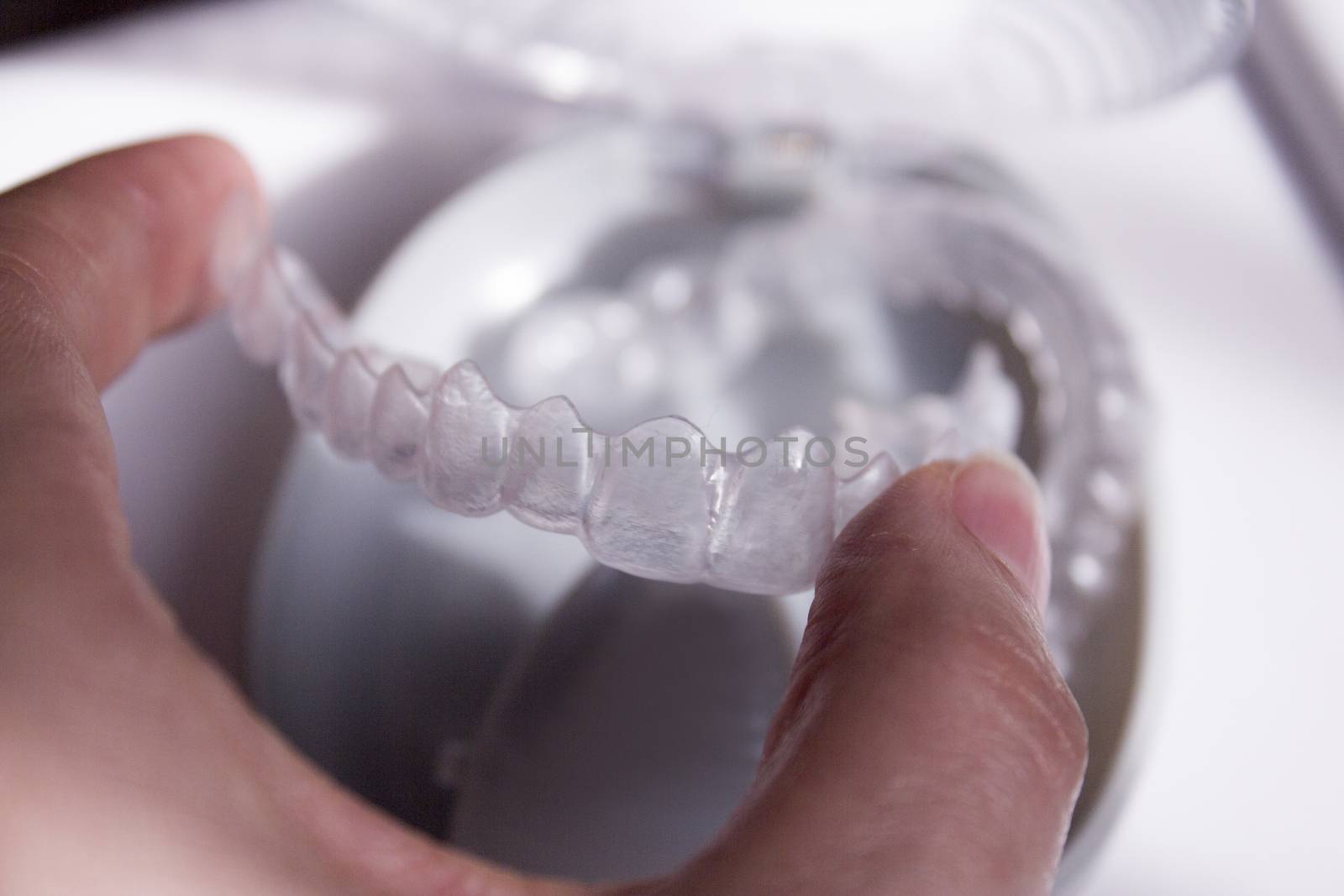 Closeup of invisible orthodontics by GemaIbarra