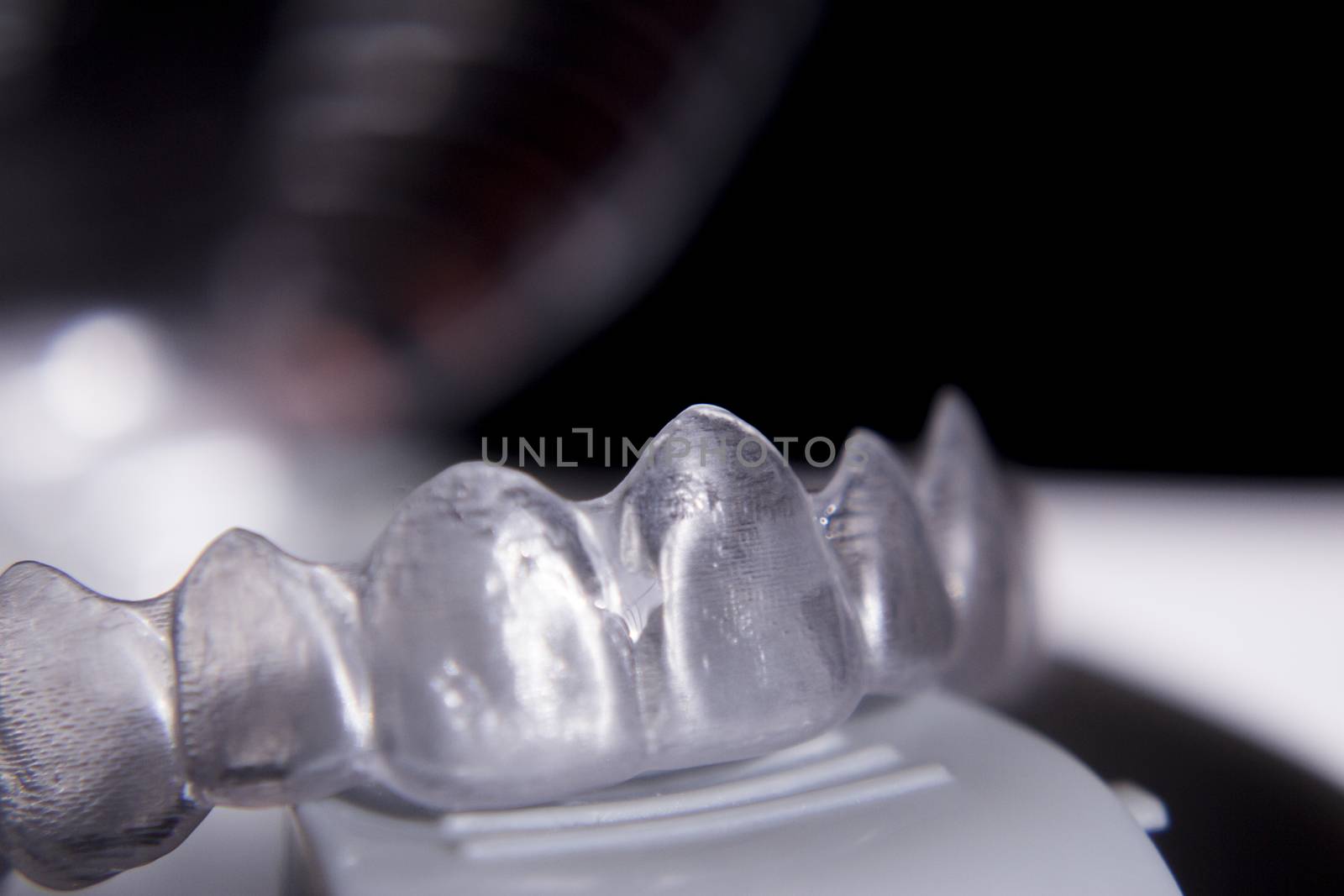 Closeup of invisible orthodontics by GemaIbarra