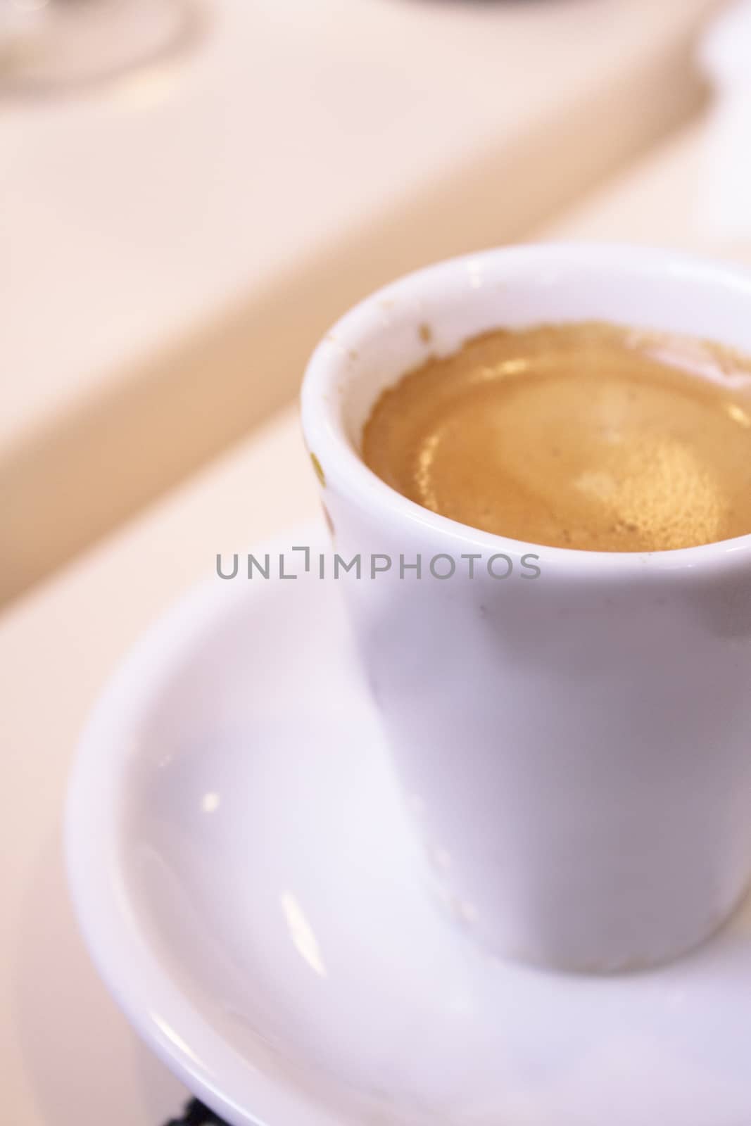 Hot coffee drink in a white cup