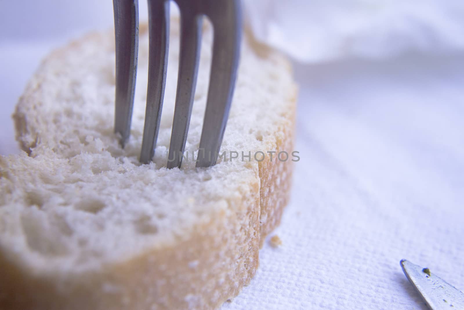Piece of bread and a fork