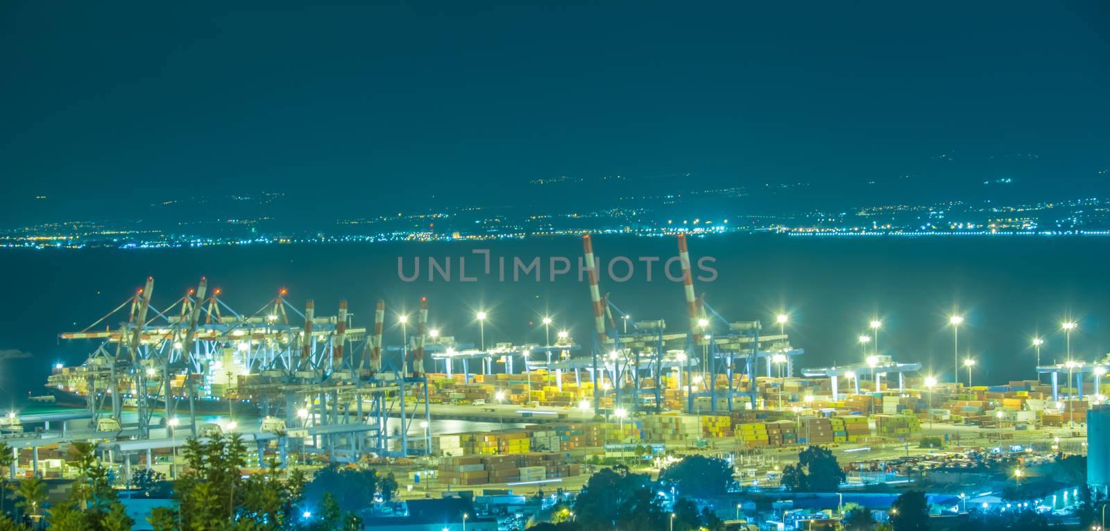 Night view of the bay of Haifa and the harbor by RnDmS