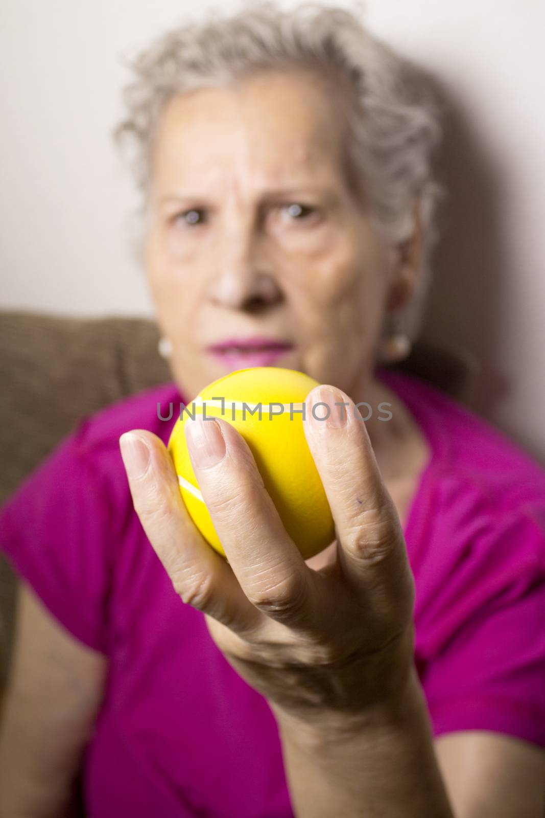 Rehabilitation exercises for an older woman with cerebral stroke