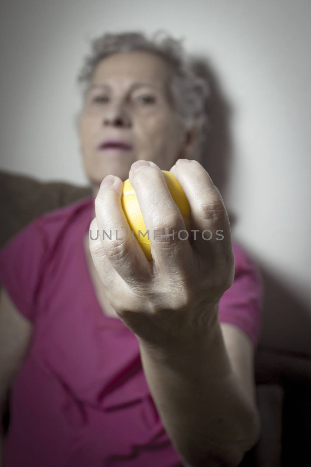 Rehabilitation exercises for an older woman with cerebral stroke