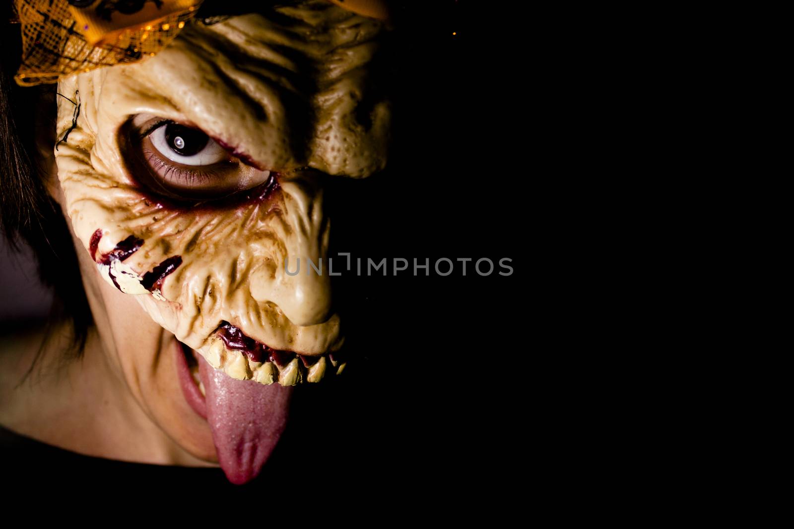 Portrait of a zombie woman at halloween party