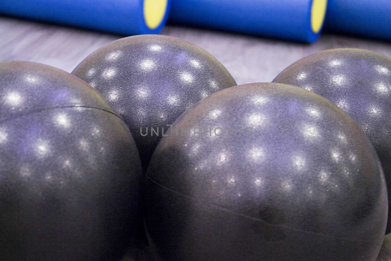 Medium size black balls for pilates exercises