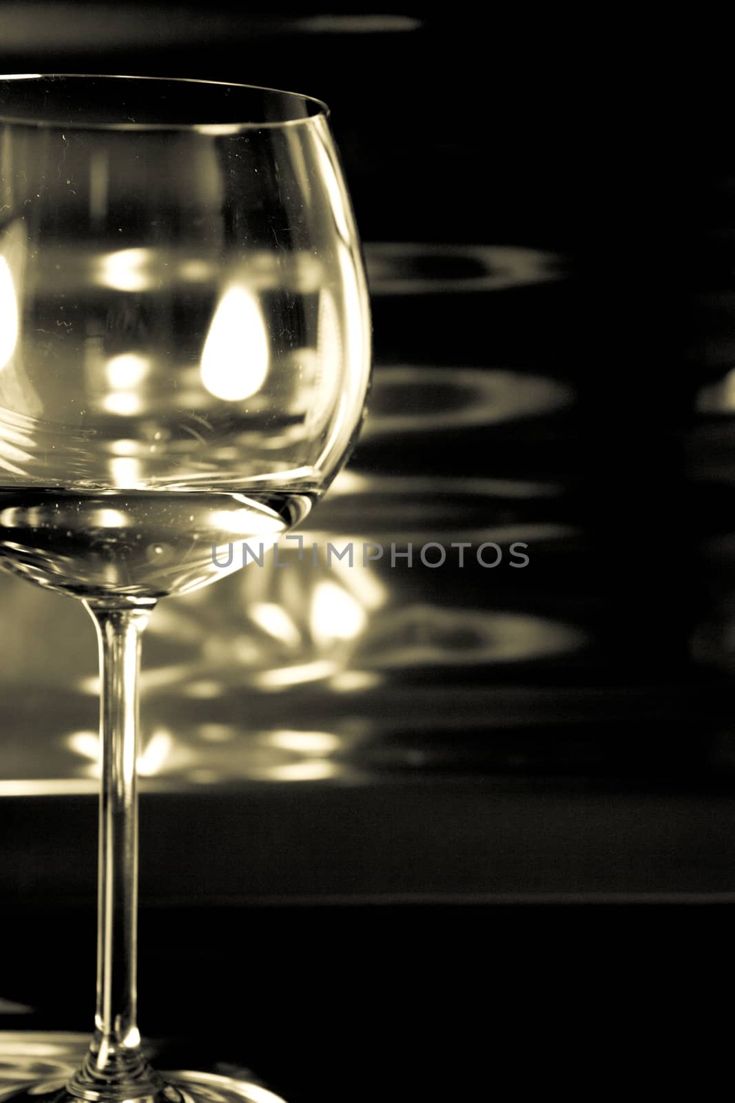Glass of red wine in nightclub. No people